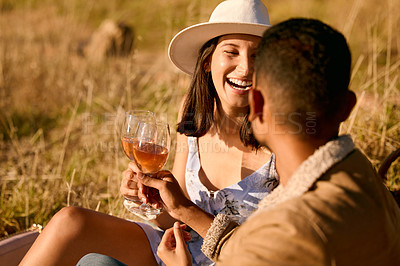 Buy stock photo Couple with wine, outdoor picnic and happiness, romantic date with alcohol and commitment with adventure. Travel, man and woman with happy people, love and care with cheers, holiday and romance