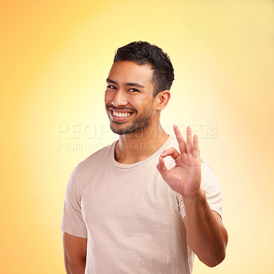 Buy stock photo Portrait, hands and man with ok sign in studio isolated on yellow background. Hand gesture, okay emoji and happy young male model with symbol for approval, success or motivation, support or thank you