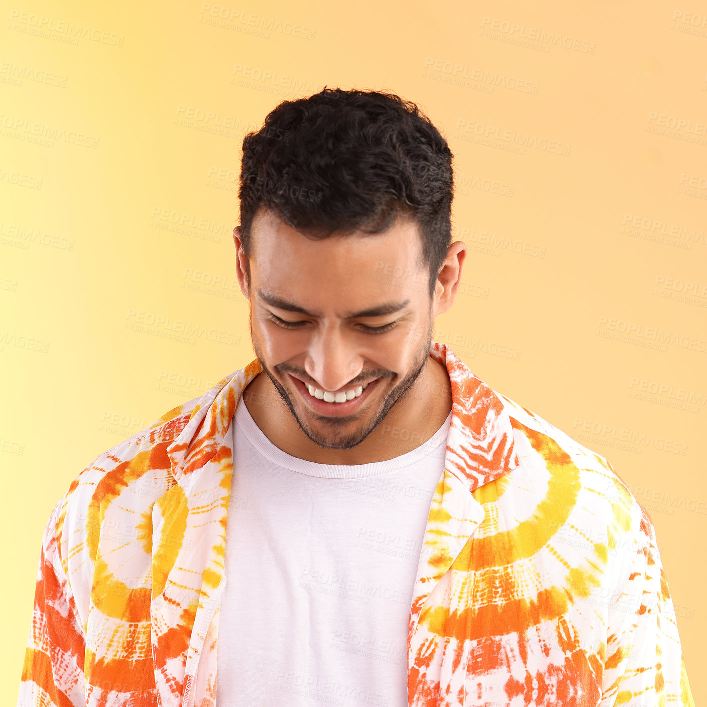 Buy stock photo Happy hipster man, studio and tie dye fashion shirt with smile, excited and relax by yellow background. Gen z model, clothes and summer style with happiness, color and natural aesthetic by backdrop