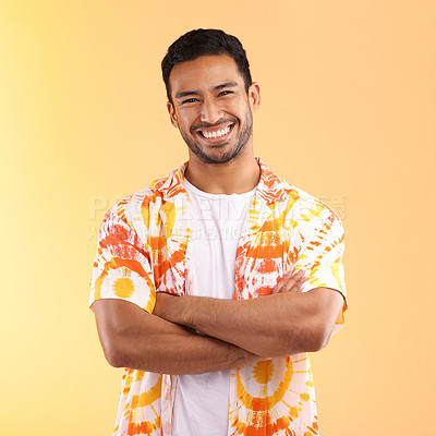 Buy stock photo Shirt, portrait and man with arms crossed in studio isolated on a yellow background. Fashion, aesthetic and happy, proud and confident man from Singapore in stylish, cool or designer tie dye clothing