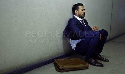 Buy stock photo Businessman, fired and depression on floor at workplace with unemployment, fail and mockup space. Professional, employee and concerned in corridor of office building with bag, leaving and helpless