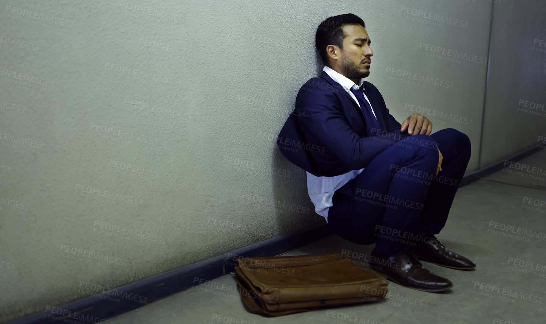 Buy stock photo Businessman, fired and depression on floor at workplace with unemployment, fail and mockup space. Professional, employee and concerned in corridor of office building with bag, leaving and helpless