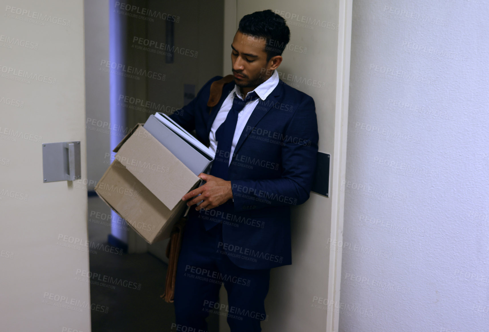 Buy stock photo Businessman, fired and stress with box in office with unemployment, failure and disappointment for leaving. Professional, employee and helpless by door of workplace with bag, frustrated and sad