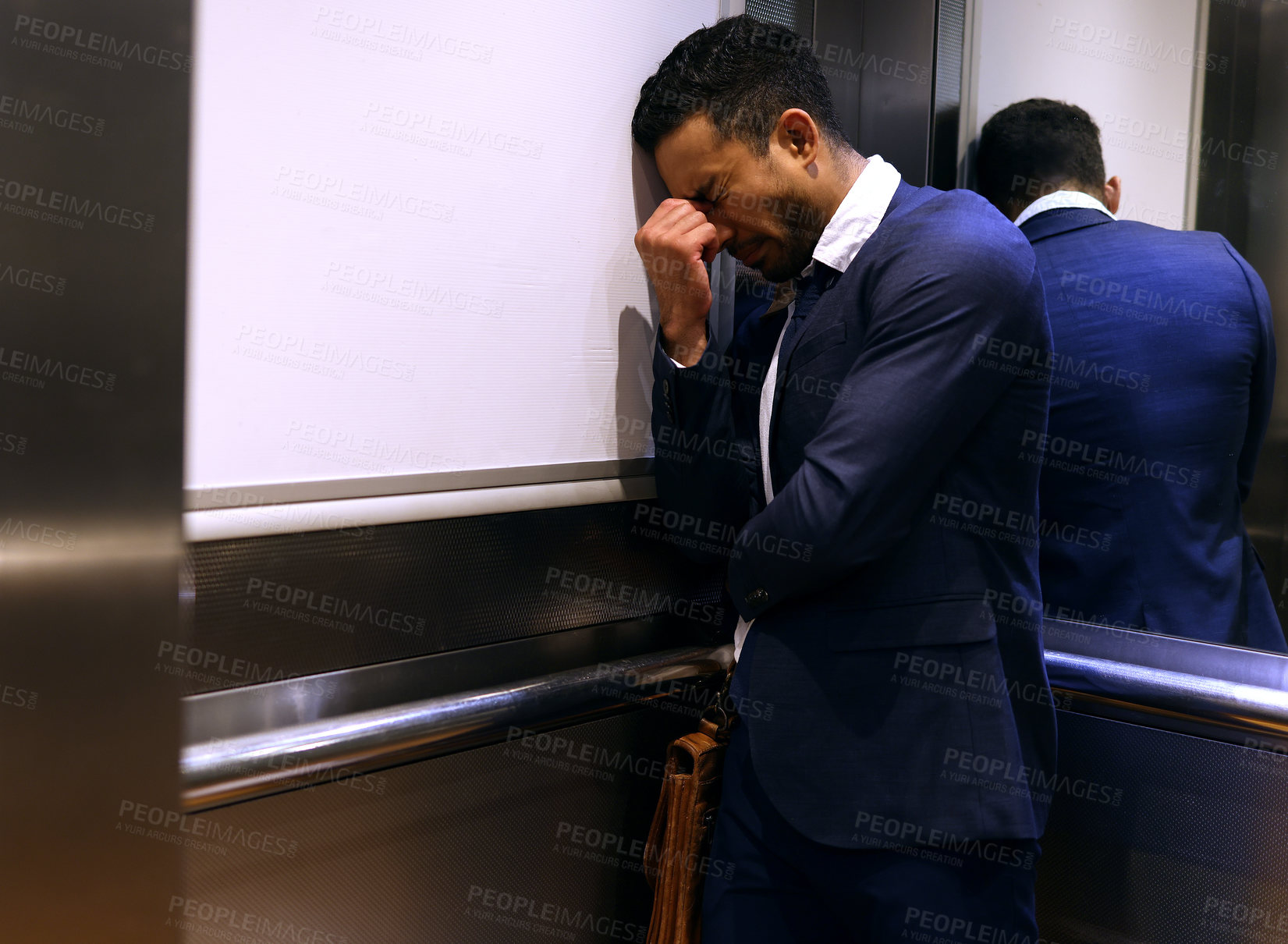 Buy stock photo Stress, depression or man cry in elevator for business fail, bankruptcy or recession disaster. Fired, termination or lawyer overthinking resignation mistake, dismissal or anxiety in inflation crisis
