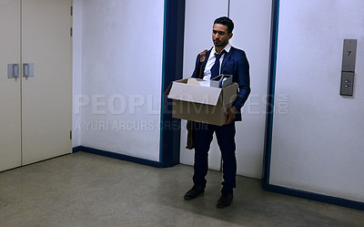 Buy stock photo Businessman, fired and sad with box at workplace with unemployment, failure and disappointment on floor. Professional, employee and helpless in corridor of office building with bag, leaving or stress