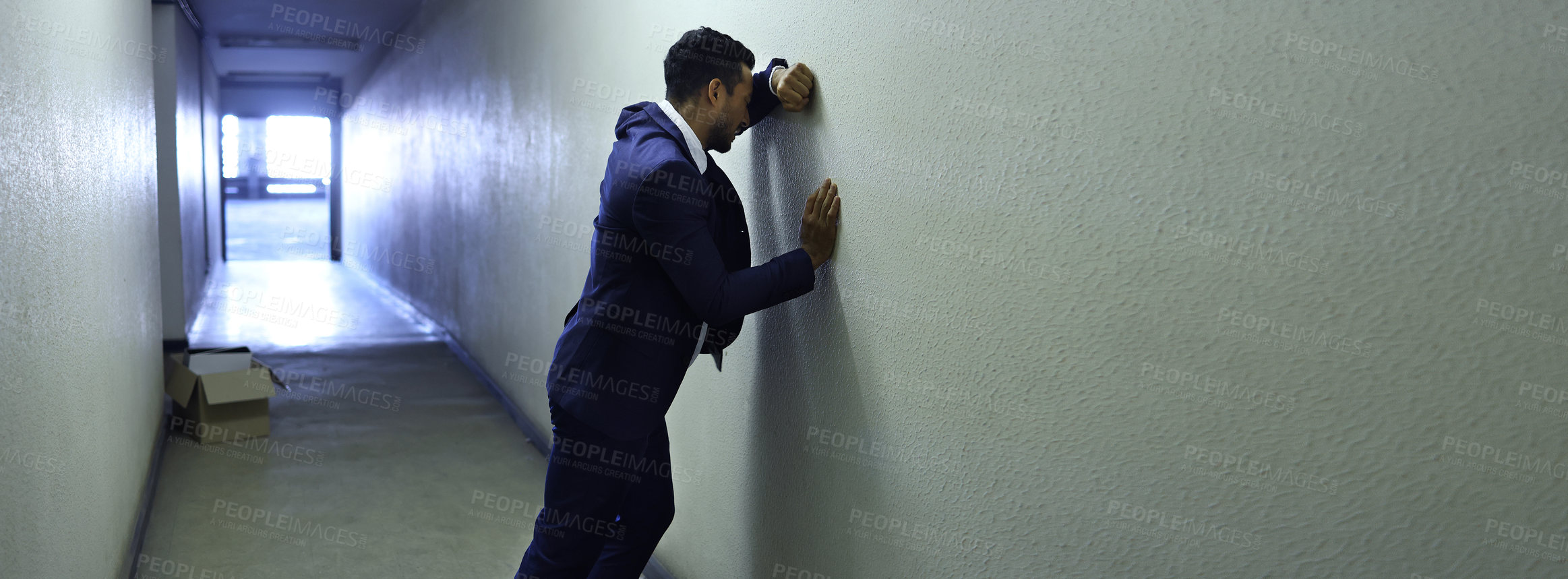 Buy stock photo Stress, depression or man crying in office building for business fail, bankruptcy or recession disaster. Fired, termination or lawyer overthinking with corridor mistake, banner or inflation crisis