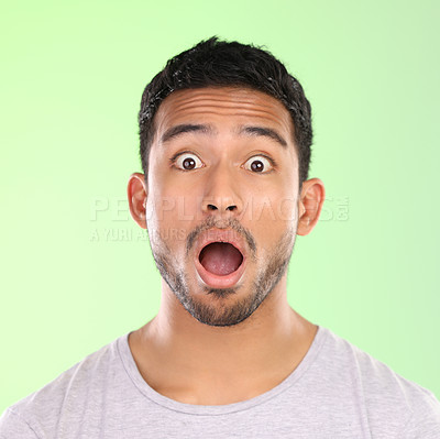 Buy stock photo Wow, shock and portrait of man in studio with amazing news, announcement and mouth open. Surprise, omg and male person with emoji face for gossip, drama and speechless emotion on green background