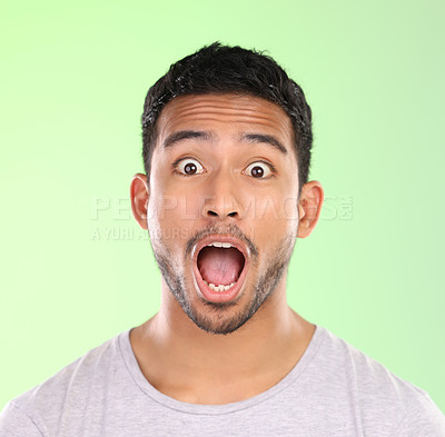 Buy stock photo Excited, shock and portrait of man in studio with amazing news, happy announcement and mouth open. Surprise, omg and male person with emoji face for gossip, drama and wow emotion on green background.