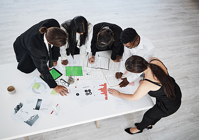 Buy stock photo Meeting, accounting and collaboration with a business team working around a table in the boardroom from above. Finance, documents and teamwork with a man and woman employee group at work in an office