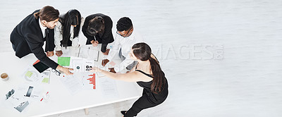 Buy stock photo Meeting, finance and collaboration with a business team working around a table in the boardroom from above. Accounting, documents and teamwork with a man and woman employee group at work in an office