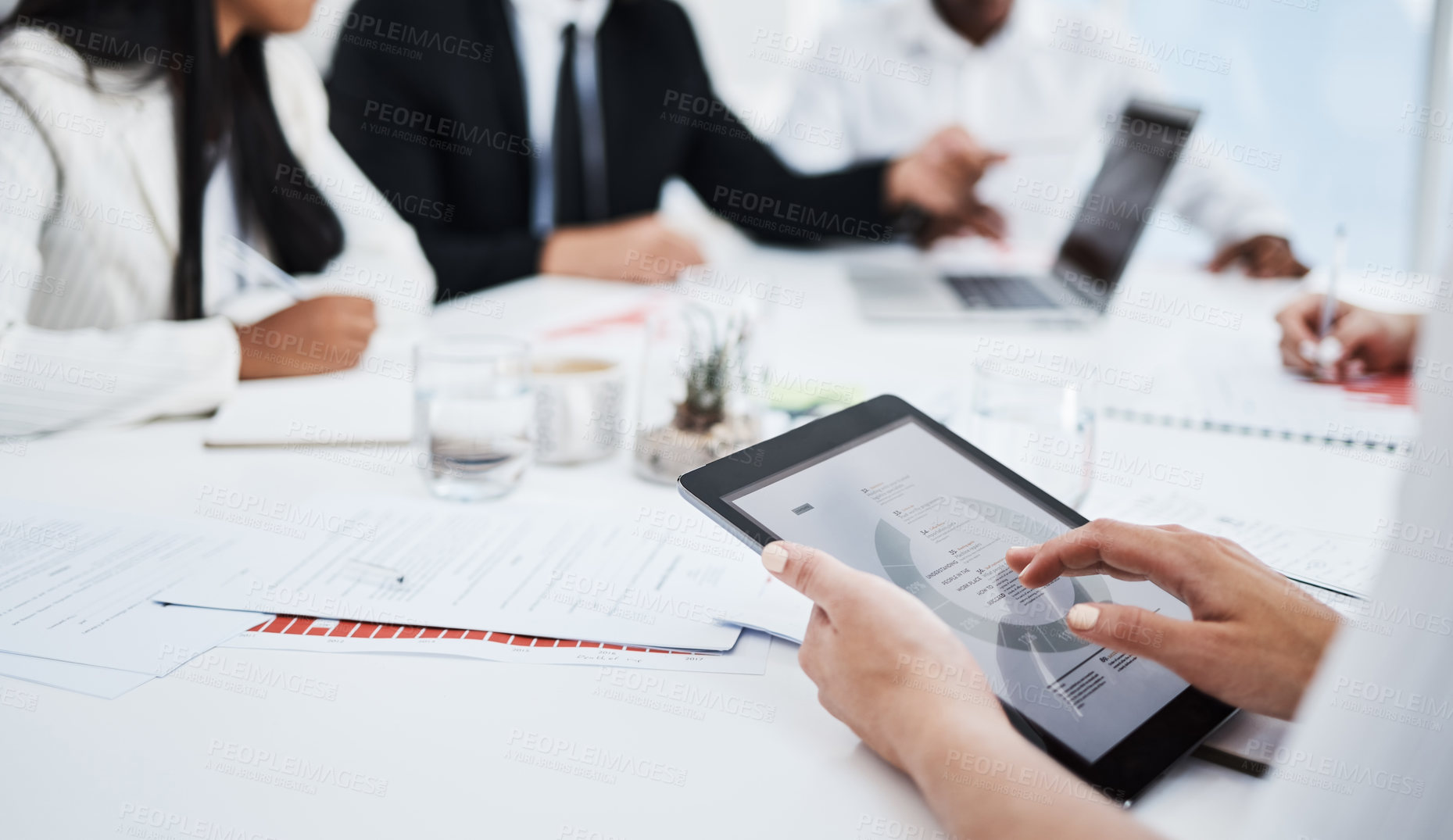 Buy stock photo Woman, hands closeup and tablet at business meeting with analytics, planning and fintech with business people. Corporate team, mobile touchscreen tech and documents on desk for financial negotiation