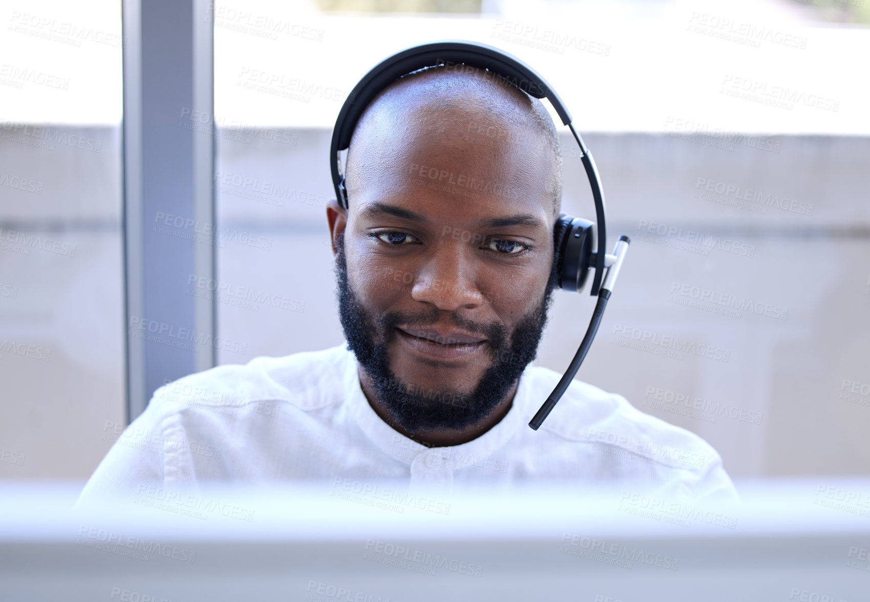 Buy stock photo Black man, face and headset in call center, contact us with CRM and phone call with client and focus. Communication, customer service with telemarketing and tech support, businessman on help desk