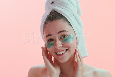 Buy stock photo Portrait, skincare and woman with eye mask happy in studio for beauty, collagen and anti aging on pink background. Face, patches and female model with skin cosmetics, facial and hydration treatment