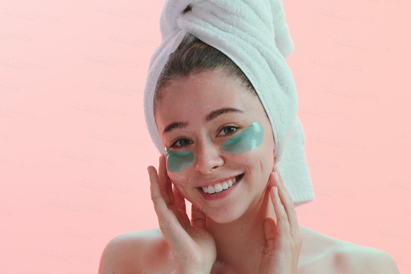 Buy stock photo Portrait, skincare and woman with eye mask happy in studio for beauty, collagen and anti aging on pink background. Face, patches and female model with skin cosmetics, facial and hydration treatment