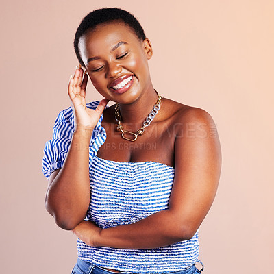 Buy stock photo Black woman, laugh and thinking with fashion, modern and influencer style in a studio. Trendy, clothes and funny joke with happy university student from Houston with orange background and smile