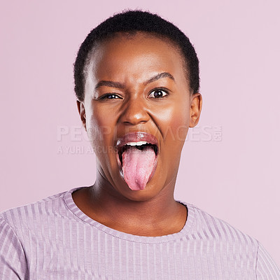 Buy stock photo Woman, eye and tongue in pink studio background with emoji in africa with closeup. Female person, face and meme with funny expression with eyes and open mouth for comedy, joy and goofy girl in youth.