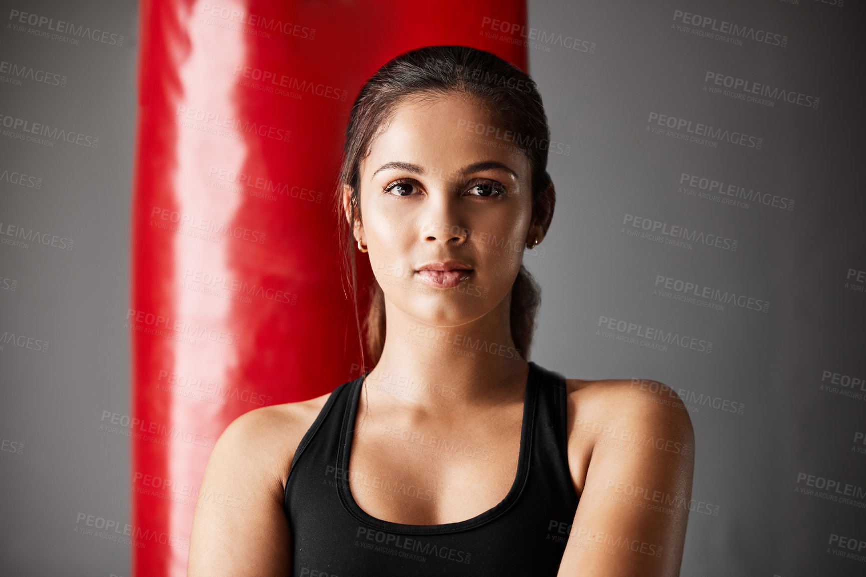 Buy stock photo Woman, health and portrait in gym with punching bag for fitness, workout or training for wellness. Female person, exercise and confidence for sport in mma or boxing athlete, martial arts in New York