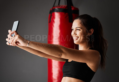 Buy stock photo Sports, selfie or woman in boxing training, exercise or workout in gym studio for confidence or fight. Pictures, girl or happy boxer vlogging with social media, fitness or power on grey background