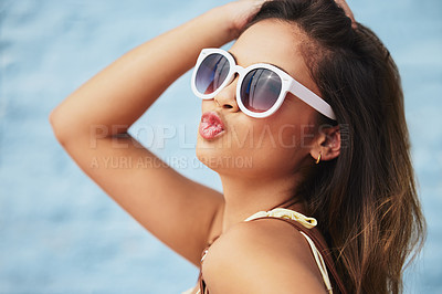 Buy stock photo Kiss, portrait and summer with woman at beach to relax on holiday, vacation or weekend travel. Face, nature and sunglasses with pouting tourist outdoor at ocean or sea for adventure and journey