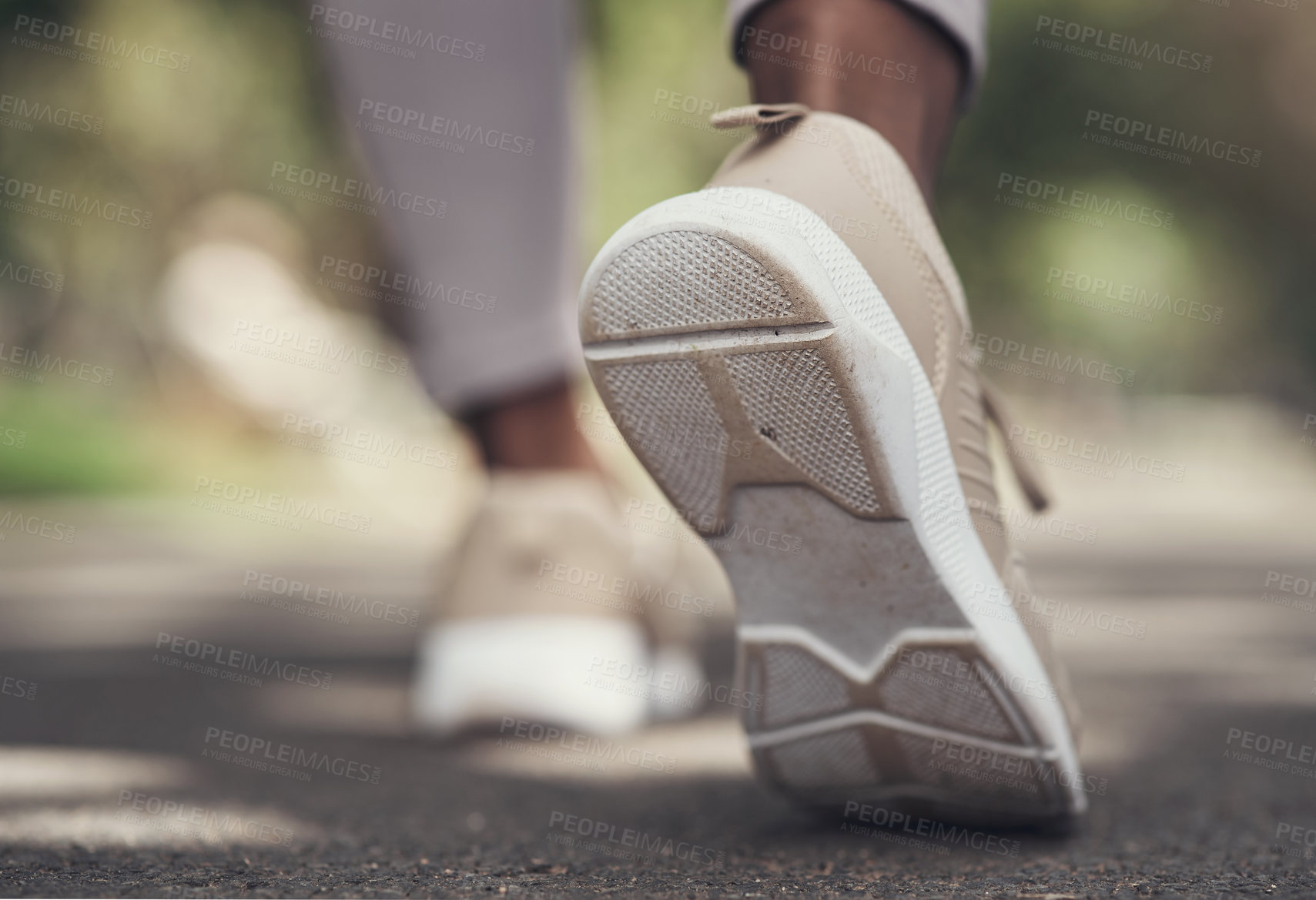 Buy stock photo Shot of a woman getting  ready to run