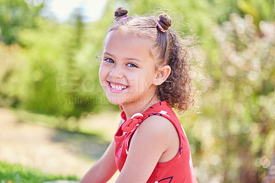 Buy stock photo Shot of an adorable little girl spending time outdoors