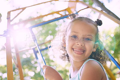 Buy stock photo Shot of an adorable little girl out on the playground