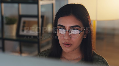 Buy stock photo Computer, night and professional with a woman editor working in an office at night for a journalism report. Face, editing and focus with a young journalist at work on a desktop for online content