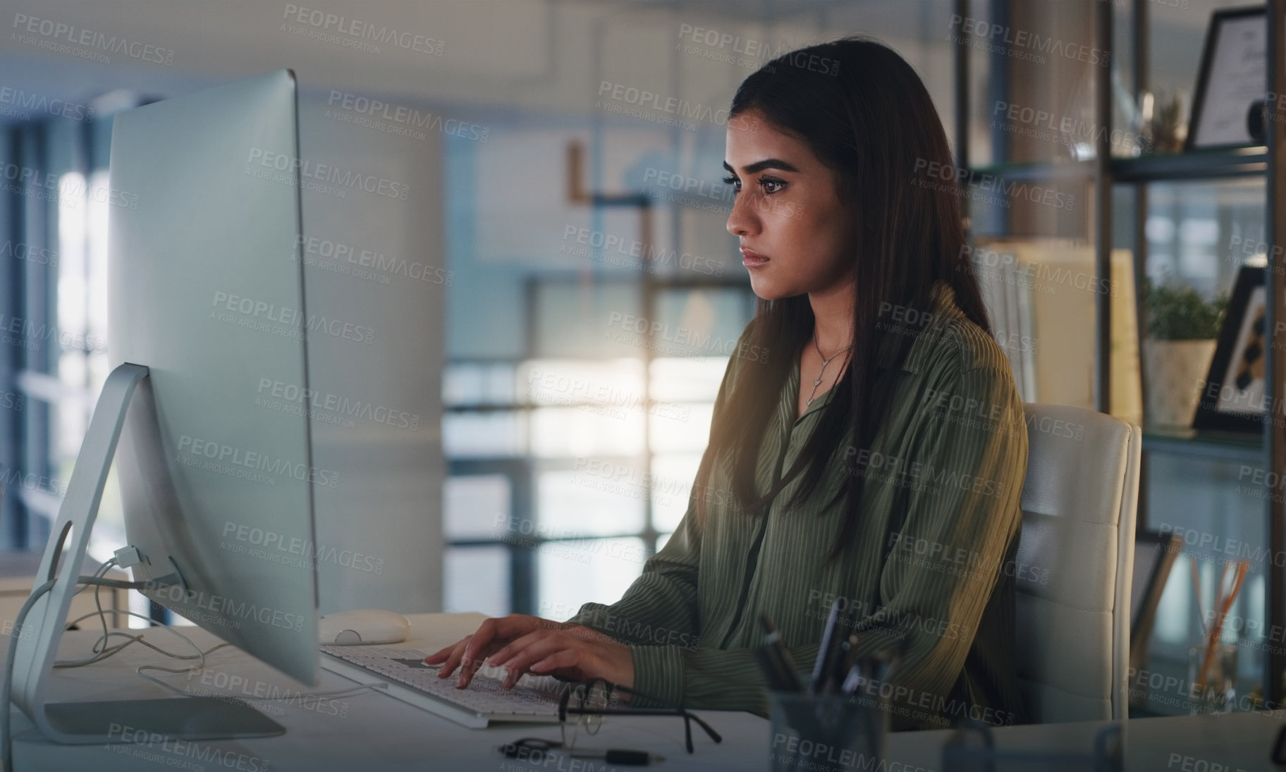 Buy stock photo Computer, night and focus with a woman editor working in her office for a journalism or news report. Typing, editing and reporting with a young journalist at work on a desktop for online content