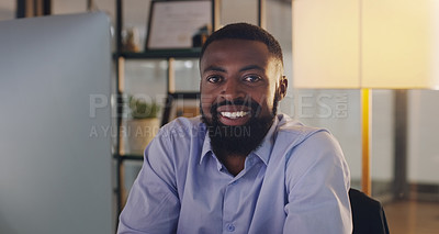 Buy stock photo Business man, portrait and computer at night while working at a desk for report or deadline. Happy black male entrepreneur with technology for marketing, internet connection or productivity in office