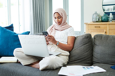 Buy stock photo Remote work, sofa and Muslim woman on laptop and phone for online project, job and research. Working from home, business and person with tech for website, internet and planning for freelance career