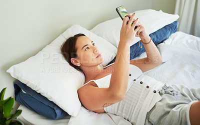 Buy stock photo Bed, relax and woman with smartphone, typing and connection for social media, calm and internet. Home, bedroom or girl with cellphone, app or online reading for email and texting contact with message