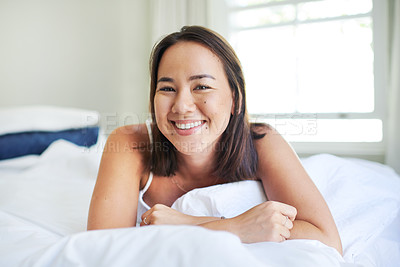 Buy stock photo Morning, portrait and asian woman wake up in bed on holiday or relax vacation with happiness from nap. Healthy, rest and girl with energy ready to start weekend in Singapore with wellness in home