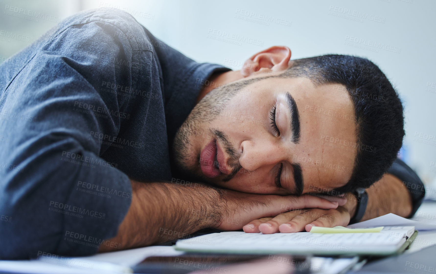 Buy stock photo Business, exhausted and man sleeping on desk in office with fatigue of project deadline or workload. Asleep, burnout and relax with tired employee lying on workplace table for break, recovery or rest