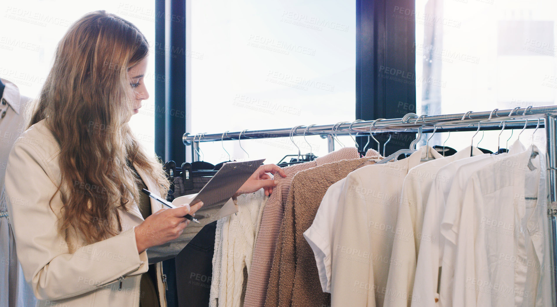 Buy stock photo Check, clothes and employee with clipboard, boutique and small business of startup, retail and fashion. Store, woman and inventory of stock on hanger, writing and notes for inspection for shop