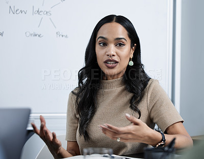 Buy stock photo Shot of a young businesswoman giving a presentation in the office