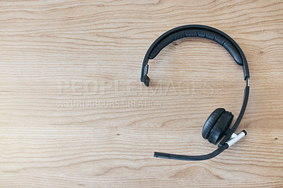 Buy stock photo Wood background, headset and contact in call center for help desk, customer service or telemarketing. Tech support, table and headphones for communication, crm or tools for online consulting business