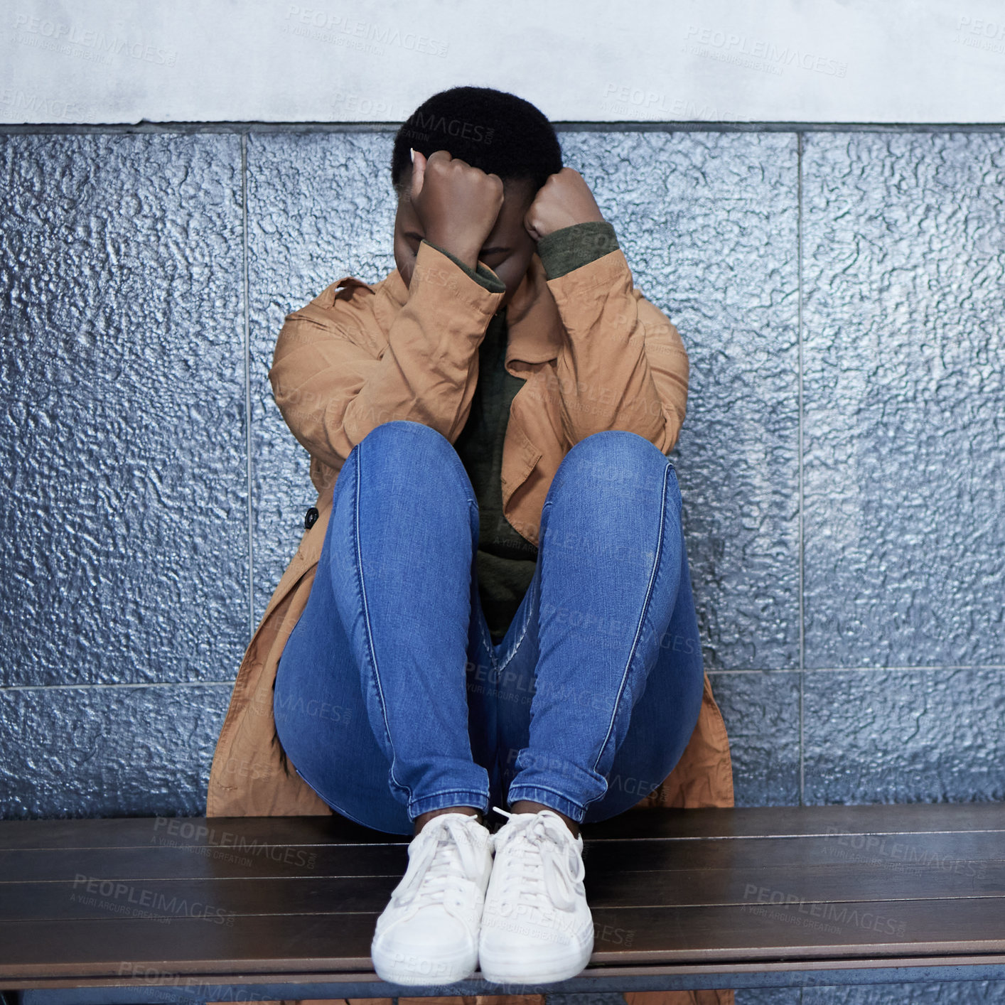 Buy stock photo Woman, depression and sad with crying in subway for bad memory, ptsd and lonely on travel. African girl, person and mental health at train station for anxiety, lost and stress for future in New York