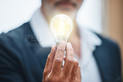 Buy stock photo Businessman, bright and hand with light for idea, innovation and creative knowledge for vision for sustainability. Growth, solution and renewable energy, electricity and power saving for eco plan