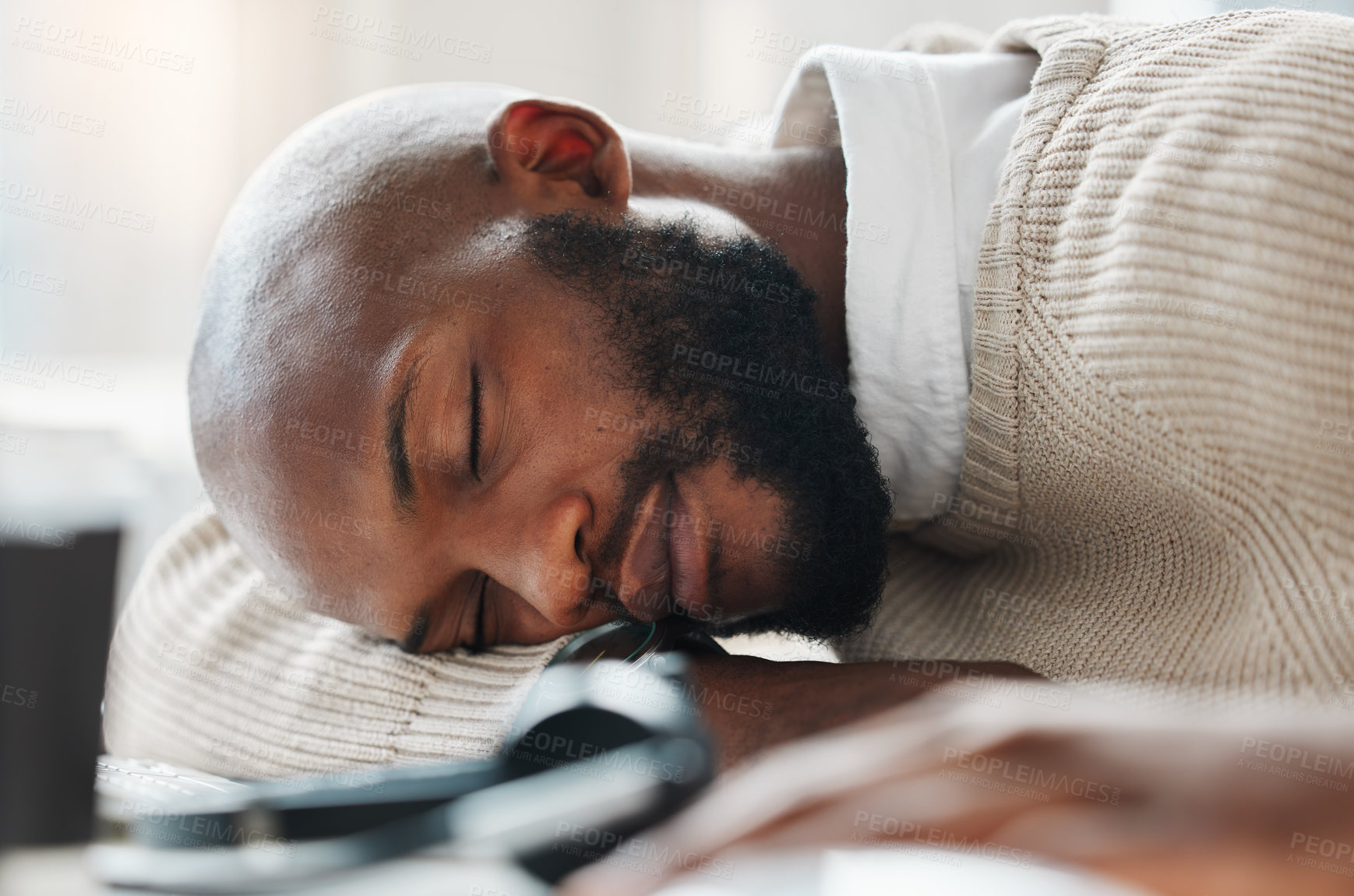 Buy stock photo Sleeping, black man and tired agent in call center overwhelmed by deadlines with fatigue in telecom. Lazy, depressed or exhausted African consultant resting in nap with burnout in customer service