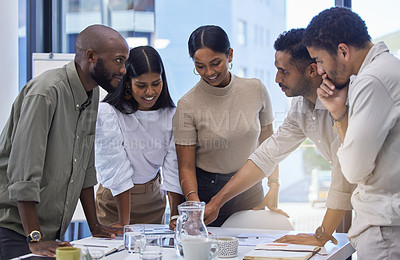 Buy stock photo Business people, team and discussion of paperwork at table in office for planning project, collaboration and ideas in startup. Group, diversity and employees meeting for brainstorming with documents 