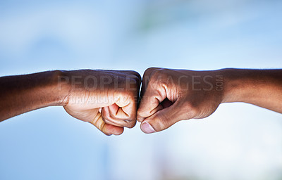 Buy stock photo Closeup shot of two unrecognisable men bumping fists
