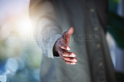 Buy stock photo Closeup shot of an unrecognisable man extending a handshake