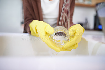 Buy stock photo Water, hands and gloves for cleaning glass, dirty dishes and person with house work for hygiene and routine. Tap, sink and remove bacteria or germs in kitchen, sustainability and housekeeping