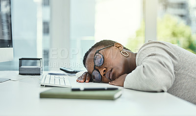 Buy stock photo Shot of a businesswoman sleeping at her desk