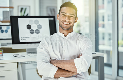 Buy stock photo Shot of a businessman sitting in a modern office