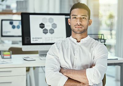 Buy stock photo Businessman, portrait and arms crossed in office with computer screen for research, analysis and project. Male developer, software and technology in workplace for review, media and website at desk