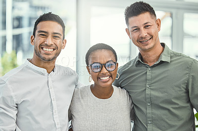 Buy stock photo Shot three businesspeople standing together in an office