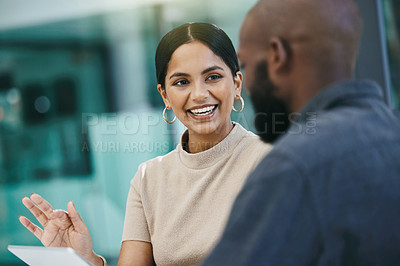 Buy stock photo Shot of a businesswoman having a meeting with her colleague while using a digital tablet