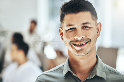 Buy stock photo Shot of a businessman smiling at a business meeting in a modern office