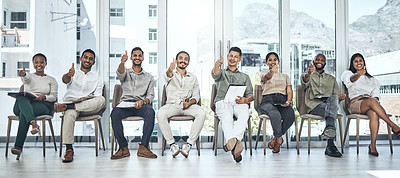 Buy stock photo Shot of a group of people showing thumbs up in a modern office